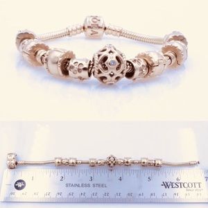 14k gold Pandora bracelet w/gold charms